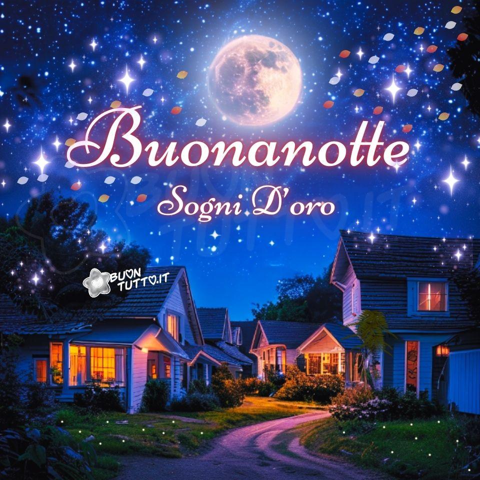 Foto di uno scorcio di un paese con le case in legno in stile rurale, illuminate da una luce calda e accogliente che filtra dalle finestre, al centro, si vede una strada sterrata illuminata dalla luce della luna. Il cielo è costellato da una miriade di stelle scintillanti, alcune delle quali sembrano brillare con una luce molto intensa. Una grande e luminosa luna piena domina il cielo, emanando una luce argentea e misteriosa. Nell’immagine ci sono inserite delle foglie dai colori caldi, che sembrano fluttuare e cadere lentamente e tantissimi punti luce che rendono l’atmosfera ancora più suggestiva e affascinante. Nella parte centrale dell'immagine, sotto la luna piena, c'è scritto in un carattere corsivo elegante con ghirigori di colore bianco e contorno sfumato di rosso Buonanotte Sogni d’oro. Un'immagine nuova e bellissima che trasmette calore, passione, stupore, serenità e pace da scaricare gratis e condividere con amici, cari, familiari, parenti gruppi tramite WhatsApp, Facebook, X Twitter, Pinterest, Telegram, LinkedIn, Instagram e le tue piattaforme social preferite. Autore BuonTutto.it 