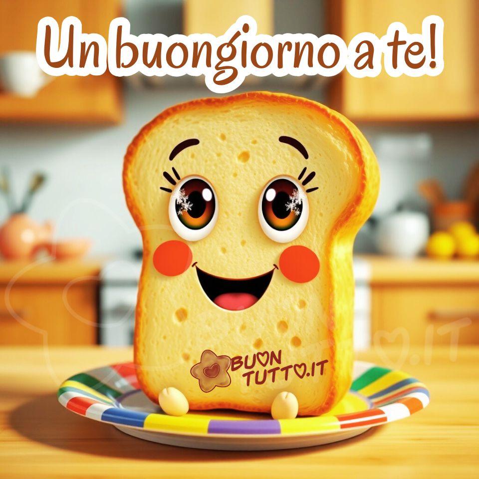 Disegno di una fetta di pane tostato raffigurata come personaggio cartoon, posizionata al centro di un piatto rotondo decorato con strisce concentriche dai colori vivaci, tra cui rosso, arancione, giallo, verde e blu. La fetta di pane ha una forma regolare, con bordi leggermente più scuri che imitano la crosta. Sul pane è disegnato un volto stilizzato e molto espressivo: gli occhi sono grandi, rotondi, brillanti e lucidi, rivolti verso l’alto come se guardassero l’osservatore; le ciglia sono lunghe e marcate, mentre le sopracciglia arcuate contribuiscono a un’espressione vivace e amichevole. Le guance sono leggermente rosate e la bocca forma un sorriso semplice e aperto. Nella parte bassa della fetta compaiono due piccoli piedi disegnati, che danno l’impressione che il personaggio sia seduto e stia aspettando con affetto e gioia. Il piatto si trova su un piano di lavoro in una cucina luminosa con mobili in legno chiaro. Lo sfondo mostra una cucina domestica ordinata e ben illuminata. I mobili sono in legno chiaro, il piano cottura è appena visibile dietro la fetta di pane e sul bancone si trovano alcuni oggetti tipici dell’ambiente: una ciotola con frutta, contenitori e utensili. La luce è uniforme e naturale, suggerendo un momento della giornata in cui la cucina è già attiva e pronta per la colazione. L’atmosfera complessiva è familiare e accogliente. Nella parte alta dell’immagine è presente la scritta, in carattere corsivo lineare con piccoli ghirigori, di colore marrone con contorno bianco in grassetto: “Un buongiorno a te!”. L’immagine è giocosa e trasmette un momento di leggerezza, divertimento, positività, tenerezza, sorpresa e simpatia, ideale da scaricare gratis e condividere con amici, familiari, parenti e gruppi tramite WhatsApp, Facebook, X Twitter, Pinterest, Telegram, LinkedIn, Instagram e le proprie piattaforme social preferite. Autore BuonTutto.it
