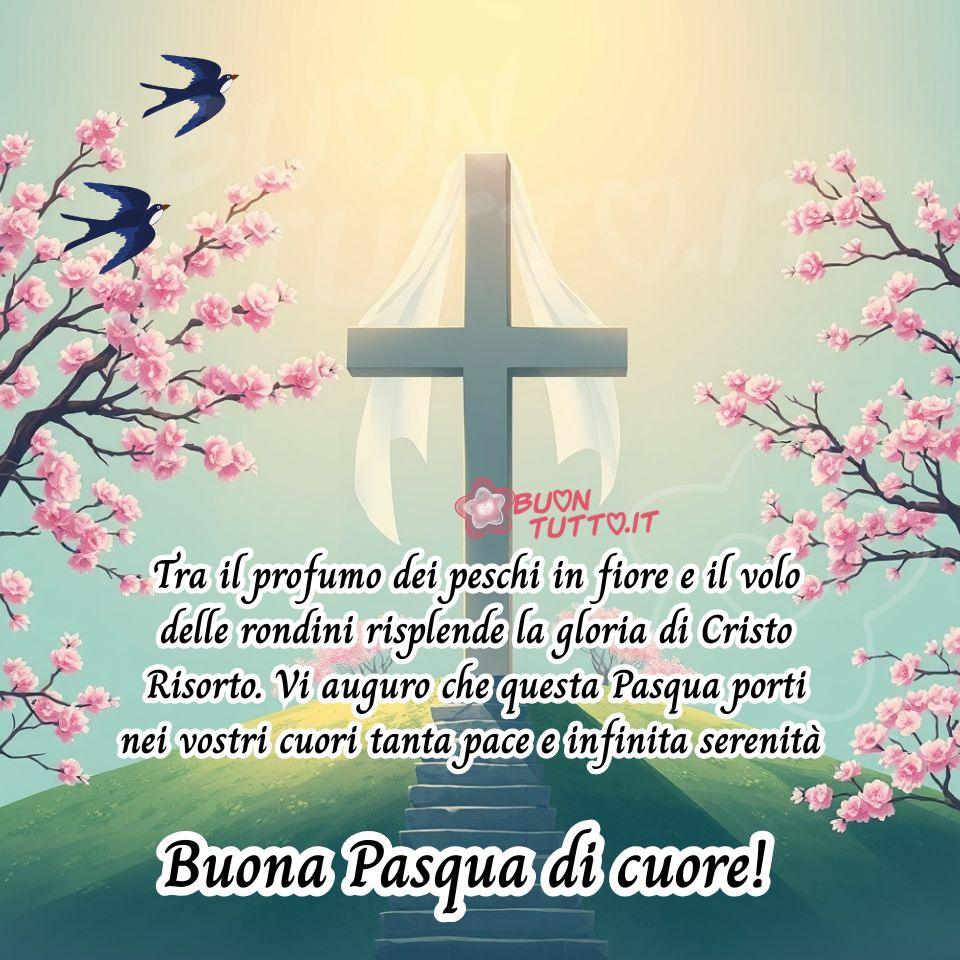 immagini-buona-pasqua-religiosa-frase-cristiana-croce-peschi-in-fiore-rondini-auguri-cuore-serenita-risurrezione-bellissima-da-condividere-gratis-buontutto L’immagine raffigura una scena pasquale luminosa e serena, dominata da una grande croce di legno, semplice e solenne, posta al centro della composizione. La croce è avvolta da un velo bianco leggero, che scende morbido sui bracci come simbolo della Resurrezione di Cristo. Il drappo, soffice e mosso da una brezza appena accennata, richiama la gloria del Cristo Risorto e la purezza della luce pasquale. Attorno alla croce si apre un paesaggio primaverile: rami di peschi in fiore esplodono in delicate tonalità di rosa, con petali che sembrano sospesi nell’aria e creano un’atmosfera profumata e rarefatta. I rami, carichi di boccioli, evocano la bellezza della primavera e il tema universale della rinascita. L’intera scena è immersa in una palette di colori pastello: sfumature di rosa, pesca, avorio e azzurro si fondono in un’armonia dolce e contemplativa. Nel cielo chiaro, sfumato dal rosa all’azzurro, volano tre rondini, simbolo di ritorno, speranza e nuovi inizi. Il loro movimento aggiunge dinamismo e un senso di libertà all’immagine. La luce è soffusa, quasi dorata, e avvolge ogni elemento con un’aura di pace, serenità, rinascita e spiritualità. Nella parte bassa dell’immagine compare un testo in carattere corsivo elegante, di colore nero con contorno bianco in grassetto: “Tra il profumo dei peschi in fiore e il volo delle rondini risplende la gloria di Cristo Risorto. Vi auguro che questa Pasqua porti nei vostri cuori tanta pace e infinita serenità.” Subito sotto, con lo stesso stile ma in dimensioni maggiori, si legge: “Buona Pasqua di cuore!” Questa immagine fa parte di una raccolta di nuove e splendide rappresentazioni della Buona Pasqua religiosa, create per essere scaricate gratuitamente e condivise con amici, persone care, familiari, parenti e gruppi attraverso WhatsApp, Facebook, Instagram, Pinterest, X (Twitter), Telegram, LinkedIn e tutte le principali piattaforme social. Un augurio pasquale che unisce la bellezza della natura alla gloria del Cristo Risorto, invitando alla serenità del cuore. Autore BuonTutto.it